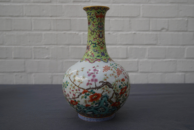 A Chinese famille rose bottle vase with floral design, Jiaqing mark, 19/20th C.